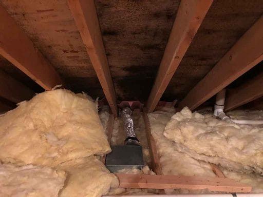 Can your bathroom fan vent into the attic or soffit
